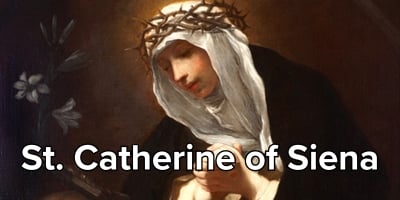 Photo of St. Catherine of Siena praying and wearing a white veil and crown of thorns